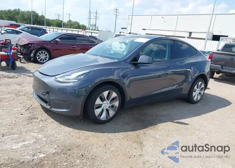 2023 Tesla Model Y from USA, damaged, VIN 7SAYGDEEXPA042147